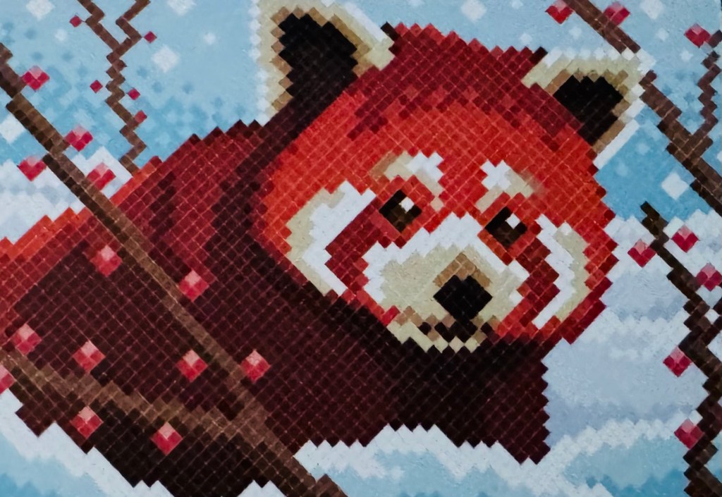 Kleurplaat van een rode panda in de sneeuw