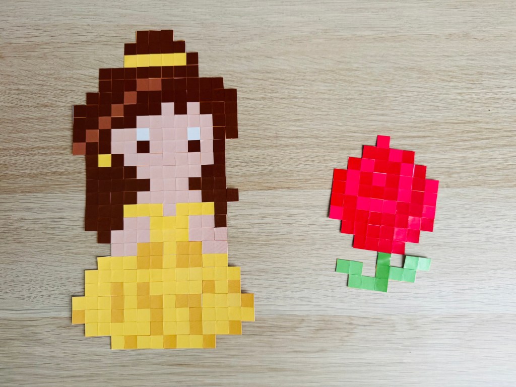 Belle en een roos van pixels