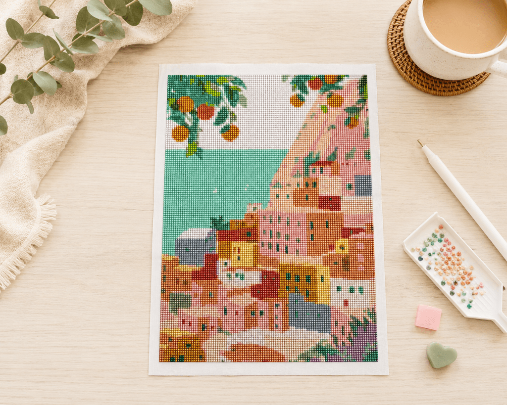 De diamond painting Positano af op een tafel