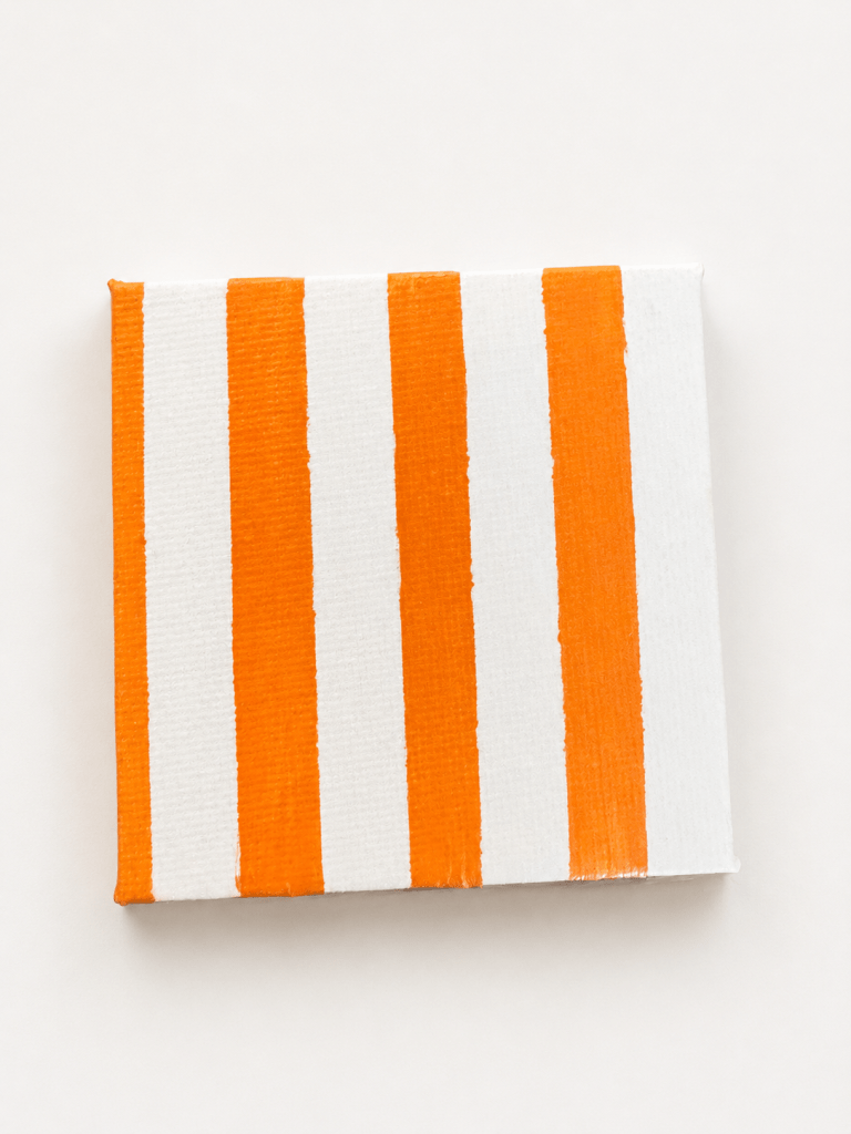 Het canvas met oranje-witte strepen